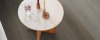 Ambiant Viranto Brown 9042.7507.19 click pvc plank in woonkamer als sfeerfoto