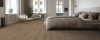 Belakos Puro 420 click PVC plank gelegd in een lichte woonkamer met een warme houtlook