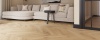 Castell Ultimate 890 293 Oak Cognac visgraat visgraat plak pvc in woonkamer sfeerfoto