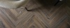 Therdex Walnut 6051 visgraat click pvc in woonkamer sfeerfoto
